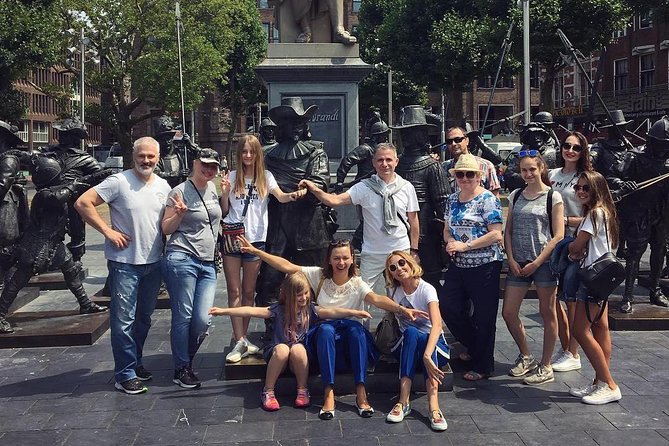 Amsterdam Sightseeing Tour + Hidden Gems + Tastings + PDF guide - Flowers, the Munttoren, and a less tidy side of tradition
