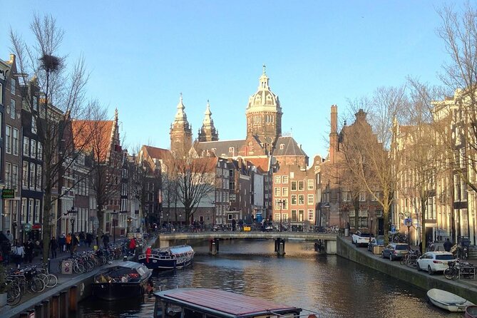 Amsterdam Sightseeing Tour + Hidden Gems + Tastings + PDF guide - Cheese and stroopwafels at Damrak