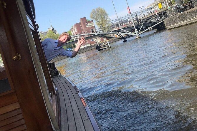 Amsterdam small-group canal cruise in 1920s saloon boat - A small boat with a big personality