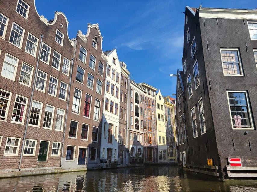 Amsterdam: Small-Group Canal Cruise incl. Drinks and Snacks - Dutch cheese, bitterballen, and drinks on board