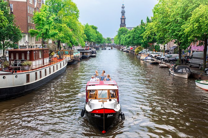 Amsterdam Small-Group Canal Cruise With Dutch Snacks and Drink - Westerkerk and the Anne Frank House from the water