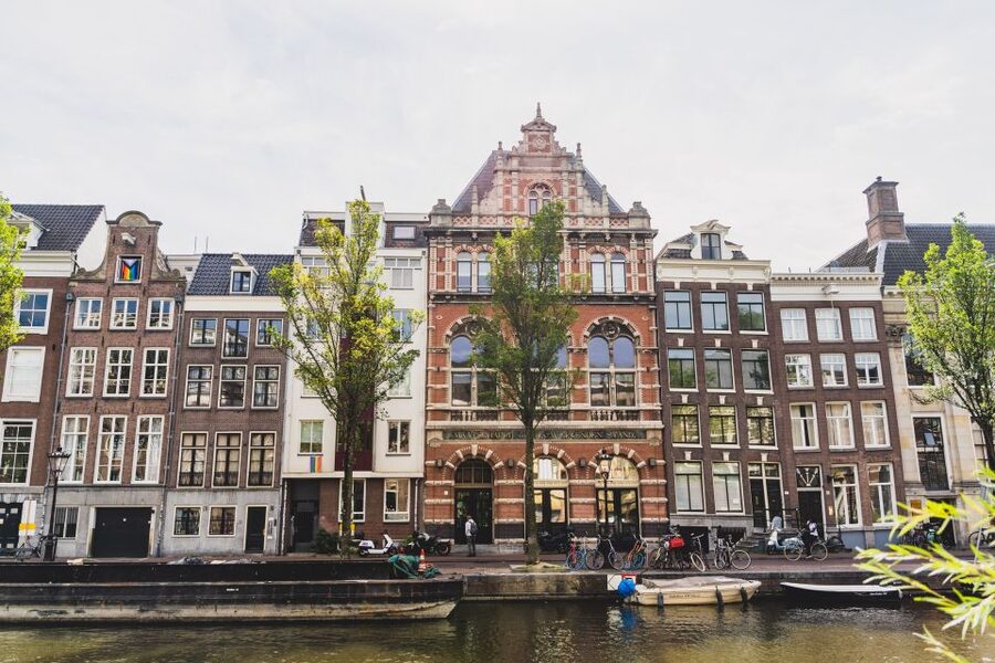 Amsterdam Small-Group Walking Tour - Begijnhof offers a quieter Amsterdam