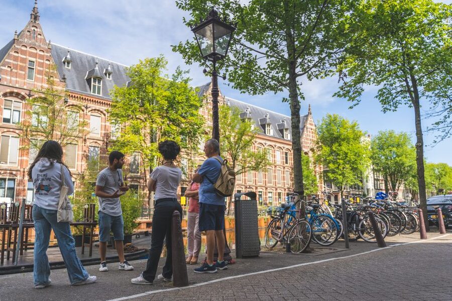Amsterdam Small-Group Walking Tour - What the guides add to the experience