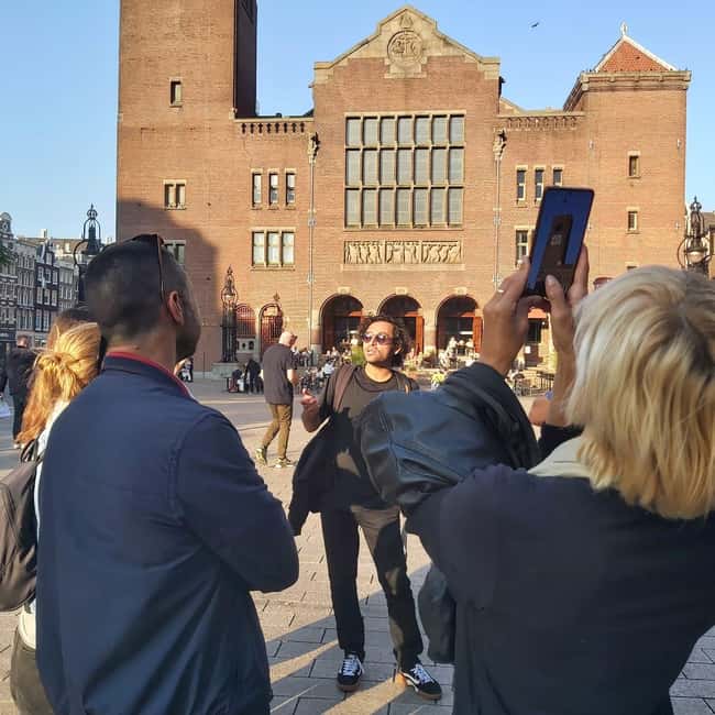 Amsterdam: Spanish Tour Unmasking the Redlight District - Starting outside Barbizon Palace Hotel