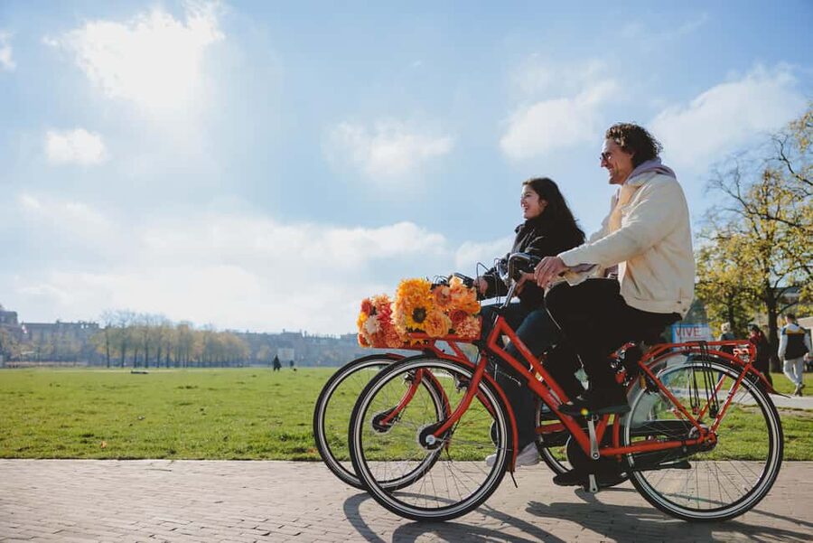 Amsterdam: Top Highlights Guided Bike Tour EN/DE/ES/FR/IT/CN - Red Light District and central Amsterdam