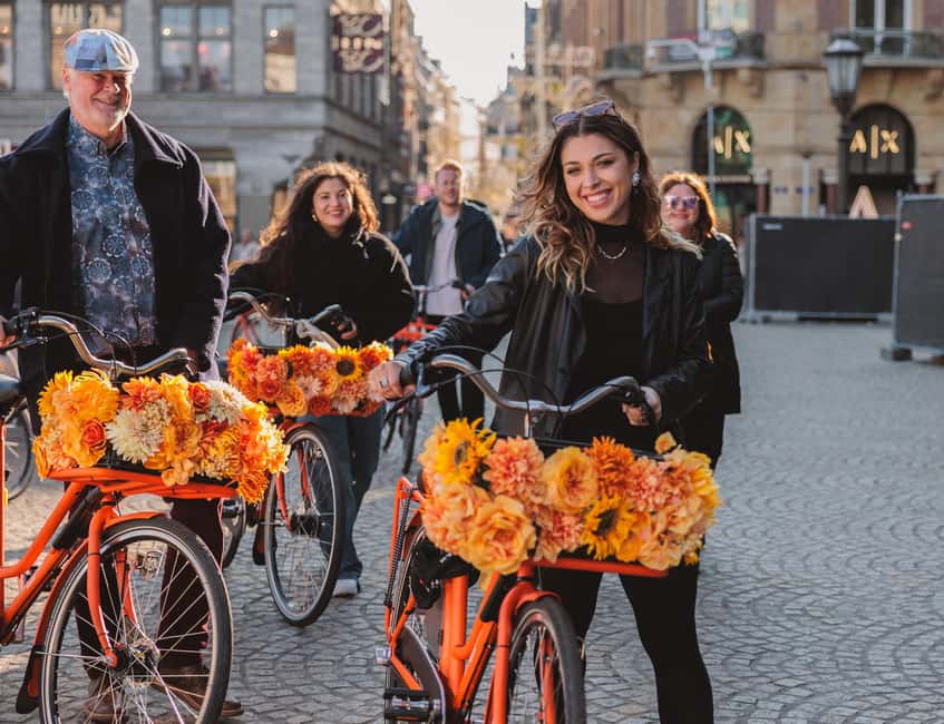 Amsterdam: Top Highlights Guided Bike Tour EN/DE/ES/FR/IT/CN - Leidse Square and a taste of local street life