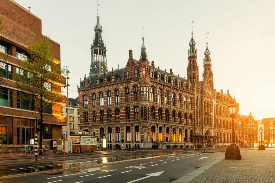 Amsterdam Walking Tour and Canal Cruise - Street markets add everyday Amsterdam