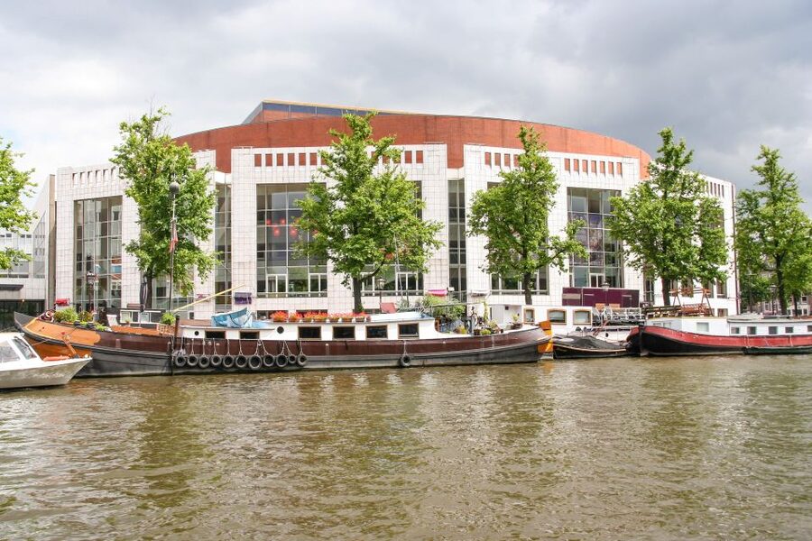 Amsterdam Walking Tour and Canal Cruise - The 60-minute cruise reveals a different city
