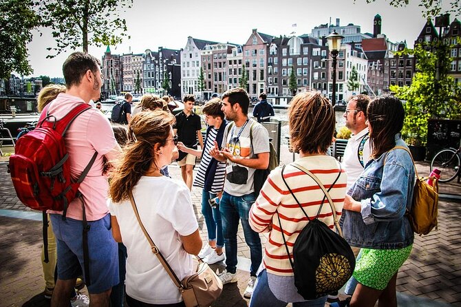 Amsterdam: Walking Tour with Dutch Pancake Lunch - Beursplein and the start beside the bull