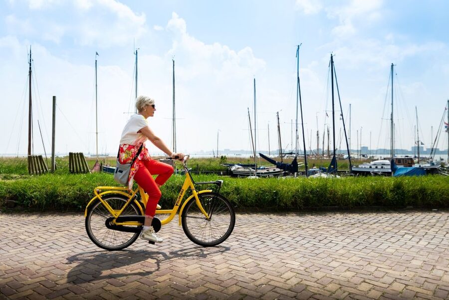 Amsterdam: Waterland District Countryside Villages Bike Tour - Starting at Nieuwezijds Kolk and crossing the water