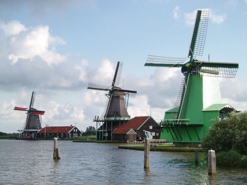 Amsterdam: Zaanse Schans Windmills Bike Tour with Guide - Cycling from Amsterdam to the Zaan River