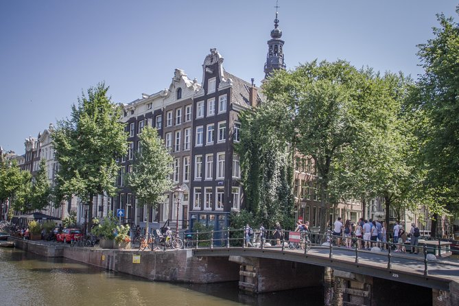 Anne Frank Private Bike Tour in Amsterdam - Language, guide style, and useful expectations