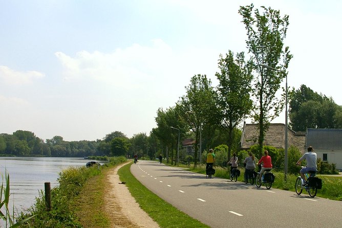 Countryside Bike Tour from Amsterdam: Cheese, Clogs & a Windmill - Waterland’s canals, fields, and quiet roads