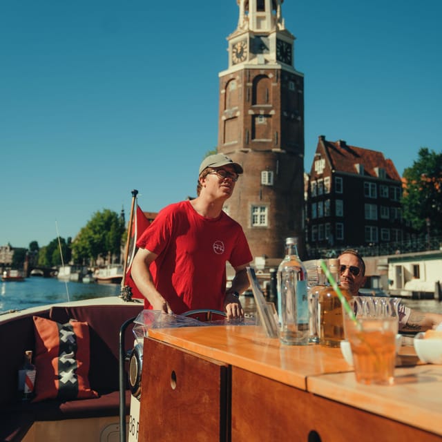 COZY AND FUN CANAL TOUR: A UNIQUE JOURNEY THROUGH AMSTERDAM - Why a small electric boat changes the Amsterdam canal ride