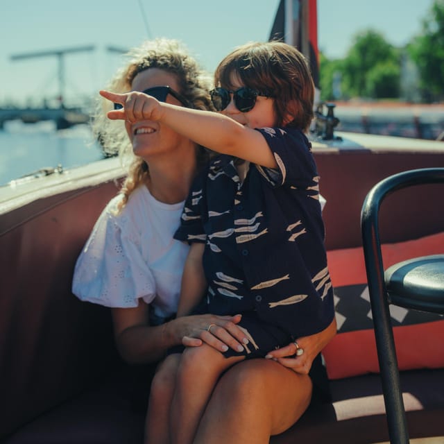 COZY AND FUN CANAL TOUR: A UNIQUE JOURNEY THROUGH AMSTERDAM - Munttoren and the return through Grimburgwal