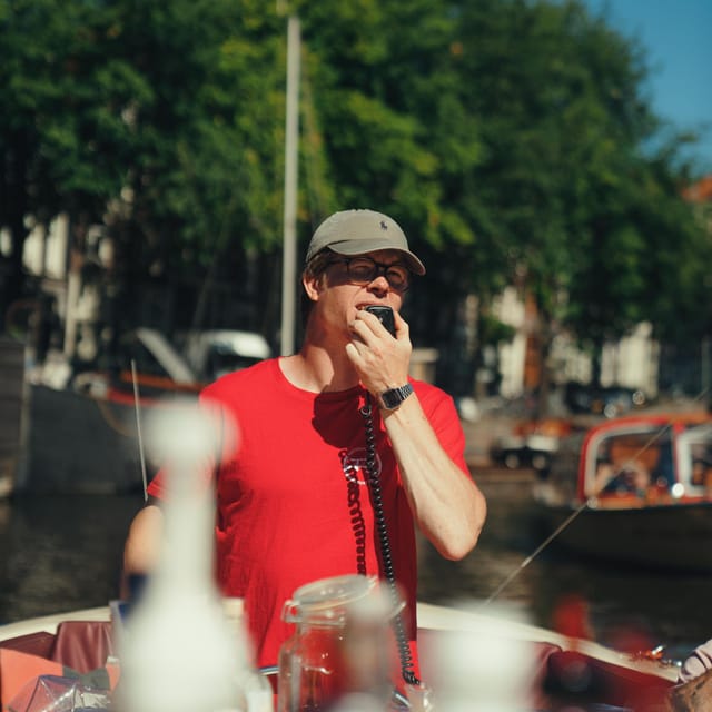 COZY AND FUN CANAL TOUR: A UNIQUE JOURNEY THROUGH AMSTERDAM - Rain, plastic windows, and the practical side of comfort