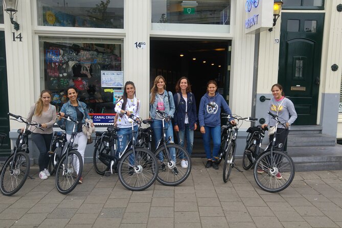 Daily group bike tour in Spanish. - Oud West and the ride toward the park