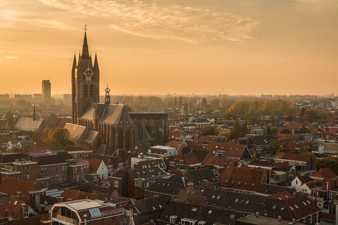 Delft: City Walk with Audio Guide in 7 Languages on your Phone - Hotel Grand Canal and Delft’s waterside character