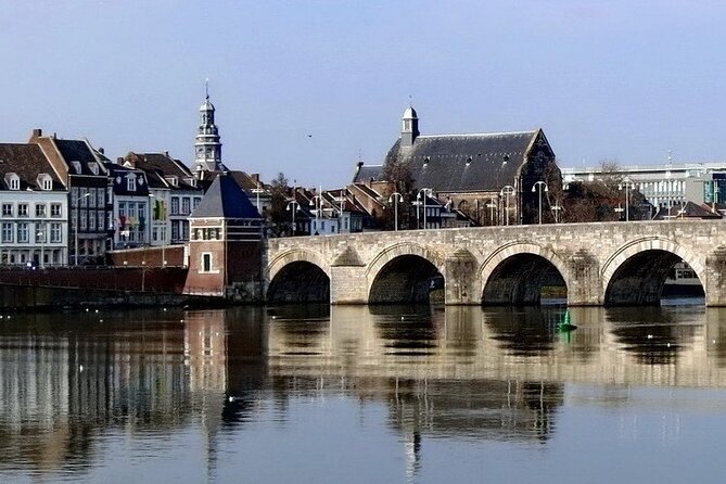 Discover Maastricht with a self-guided Outside Escape city game - Crossing Sint Servaasbrug into old Maastricht