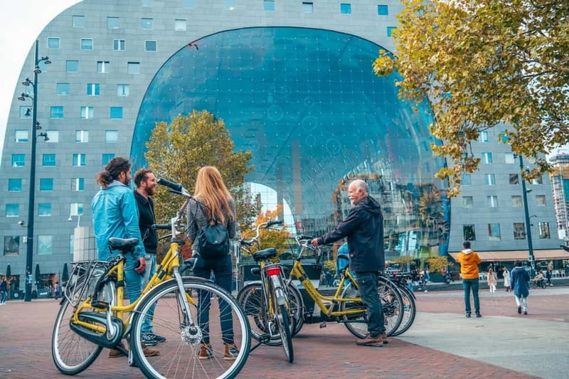 Discover Rotterdam: Classic Highlights Bike Tour by a Local - Hotel New York and the Erasmus Bridge