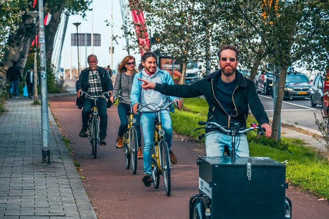 Discover Rotterdam: Classic Highlights Bike Tour with a Local - Hotel New York and the view toward Fenix