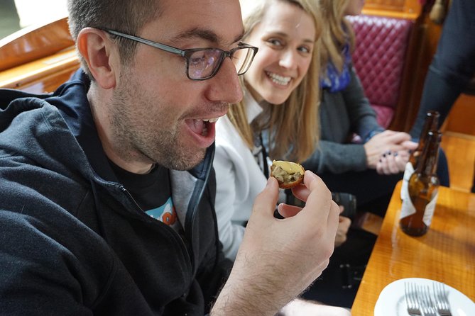 Eating Amsterdam: Food Tour & Canals Cruise - The Jordaan’s alleys and Amsterdam’s difficult past