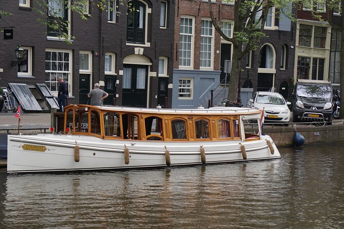 Eating Amsterdam: Food Tour & Canals Cruise - Poffertjes, bitterballen, and a proper Dutch finish