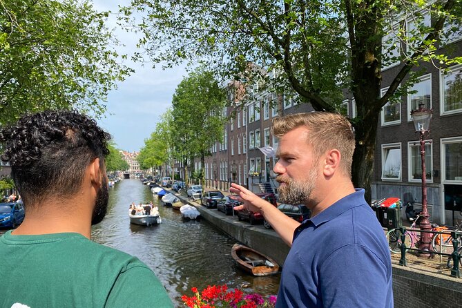 Explore hidden streets with friends - Anne Frank House and Westerkerk from the outside