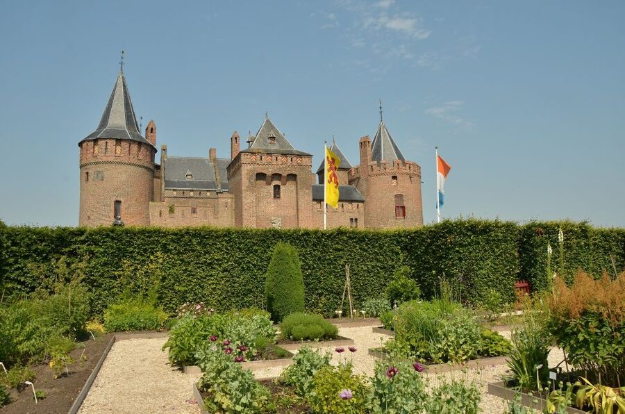 From Amsterdam: Amsterdam Castle Muiderslot Private Tour - Entering a 13th-century Dutch castle