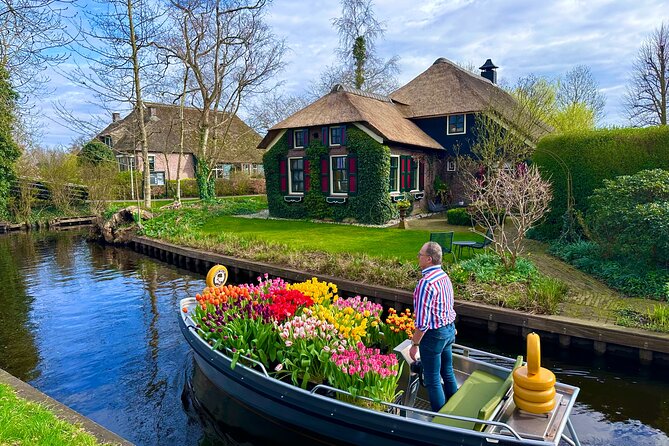 From Amsterdam: Giethoorn Day Trip with Canal & Village Tour - A windmill stop adds Dutch context