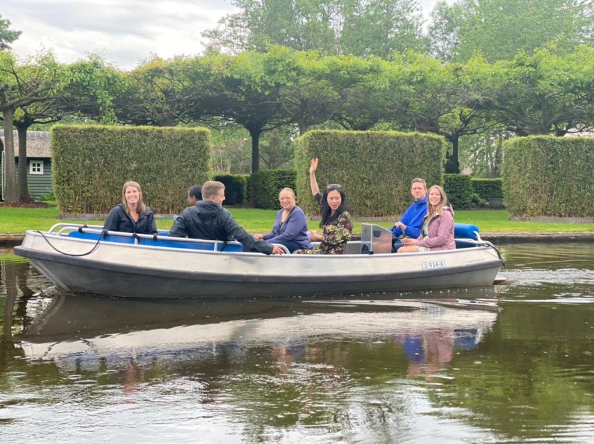 From Amsterdam: Giethoorn Day Trip with Small Electric Boat - Seeing Giethoorn from a small electric boat