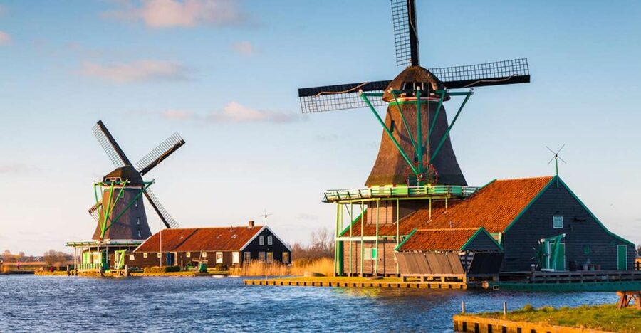From Amsterdam: Windmills of Zaanse Schans Tour - Language, guide time, and the tour’s pace