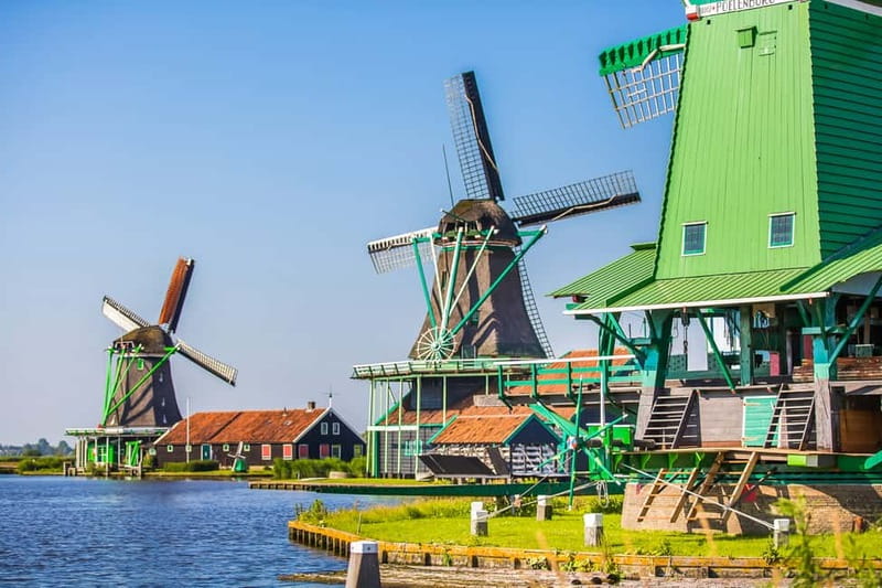 From Amsterdam: Zaanse Schans, Volendam, and Marken Day Trip - Guides, group size, and the pace of the day