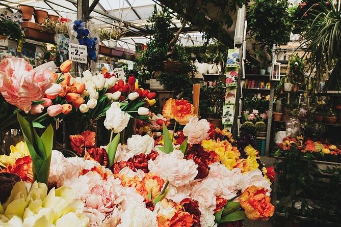 Full-Day Trip From Amsterdam to Keukenhof, Zaanse Schans + Cruise - Keukenhof and the flower fields around Lisse