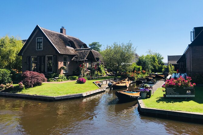 Giethoorn, Afsluitdijk, Zaanse Schans Day Tour Incl Hotel Pick Up - Zaanse Schans: cheese, clogs, windmills, and a diamond stop