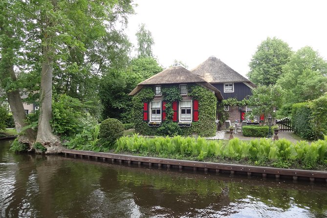 Giethoorn Day Tour from Amsterdam with Small Boat Ride - The one-hour small electric boat ride