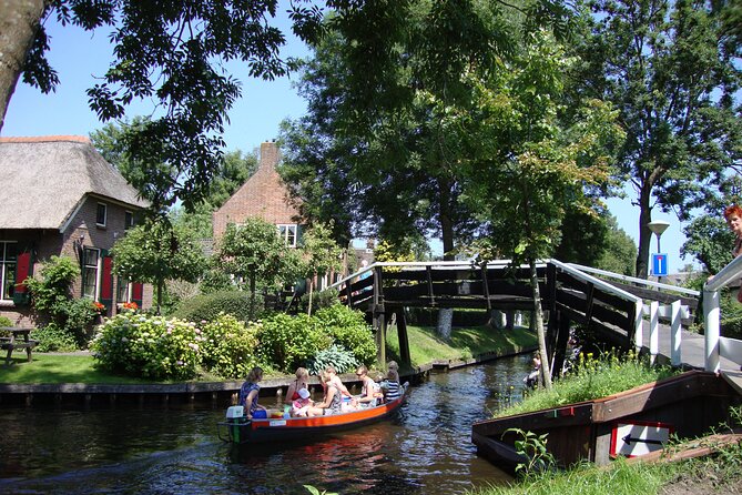 Giethoorn Day Trip from Amsterdam With Cruise and Cheeseplatter - Returning to Amsterdam by coach