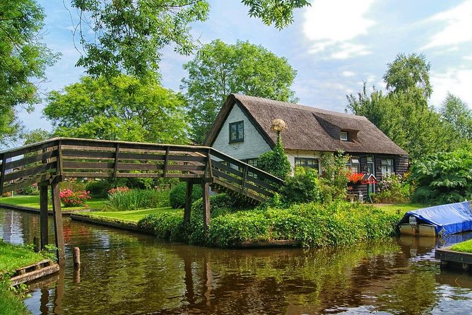 Giethoorn Private Tour, Canal Cruise and Windmills from Amsterdam - Clogs, cheese, and the commercial side of Dutch culture