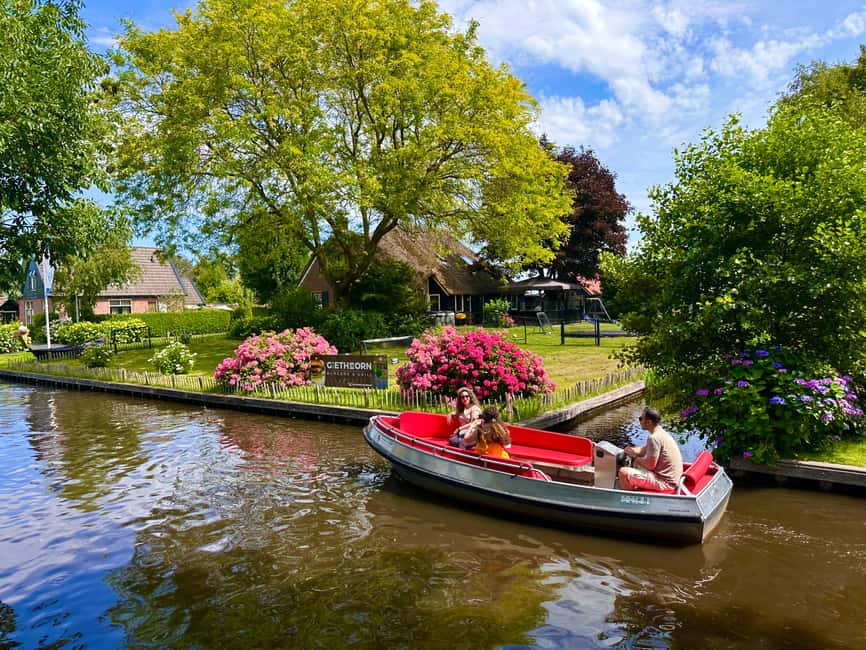 Giethoorn: Round trip from Amsterdam optional guided cruise - Four hours for lunch, bridges, and photos