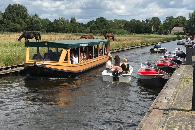 Giethoorn, Zaanse Schans Windmills Guided Day Trip from Amsterdam - One hour on Giethoorn’s canals