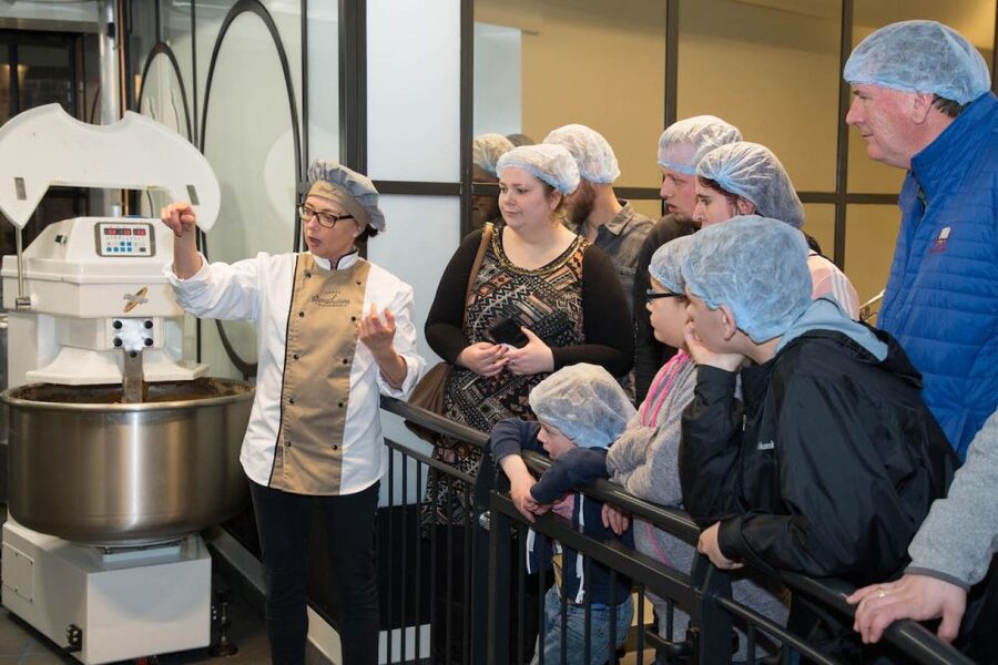 Gouda: Syrup Waffle Factory Ticket with a Waffle - Watching the bakers and machines at work