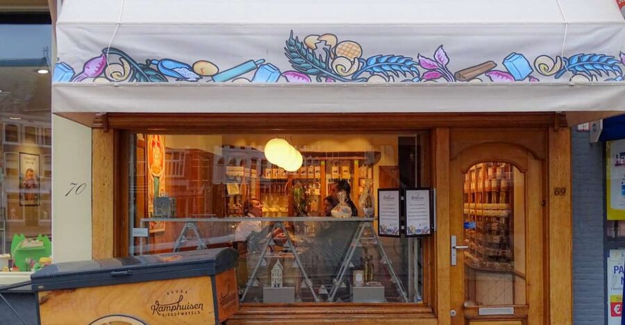 Gouda: Syrup Waffle Factory Ticket with a Waffle - The 1810 story behind the syrup waffle