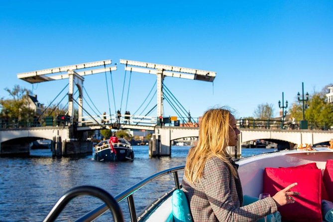 Guided Amsterdam Canal Cruise – Snacks & Drinks on board(1 Hour) - Why this small boat gives you a better look at Amsterdam