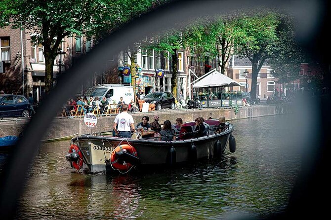 Guided Amsterdam Canal Cruise – Snacks & Drinks on board(1 Hour) - Jewish heritage and difficult chapters of the city