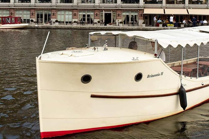 Guided Amsterdam Canal Cruise – Snacks & Drinks on board(1 Hour) - A canal-side view of Hortus Botanicus