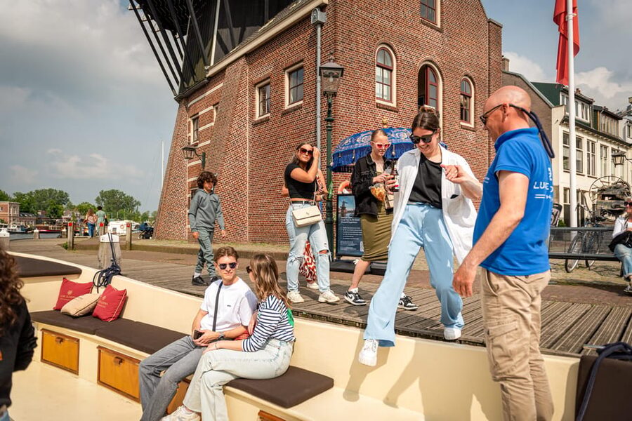 Haarlem: Guided Highlights Canal Cruise on Open Boat - A quiet start at Windmill De Adriaan