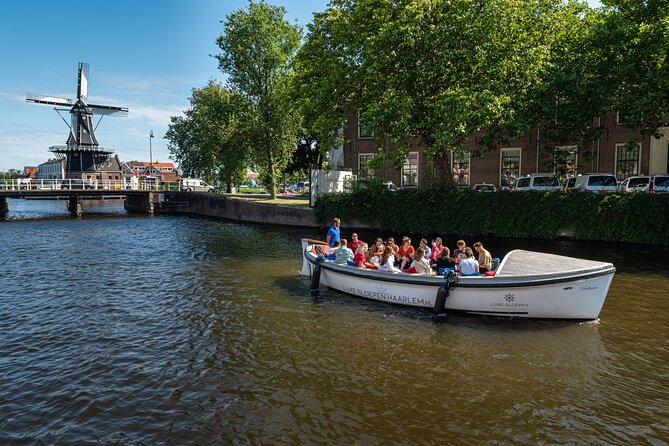 Haarlem Open-Boat Canal Cruise with Live Guide (Electric Boat) - Cushioned benches, open skies, and a toilet onboard