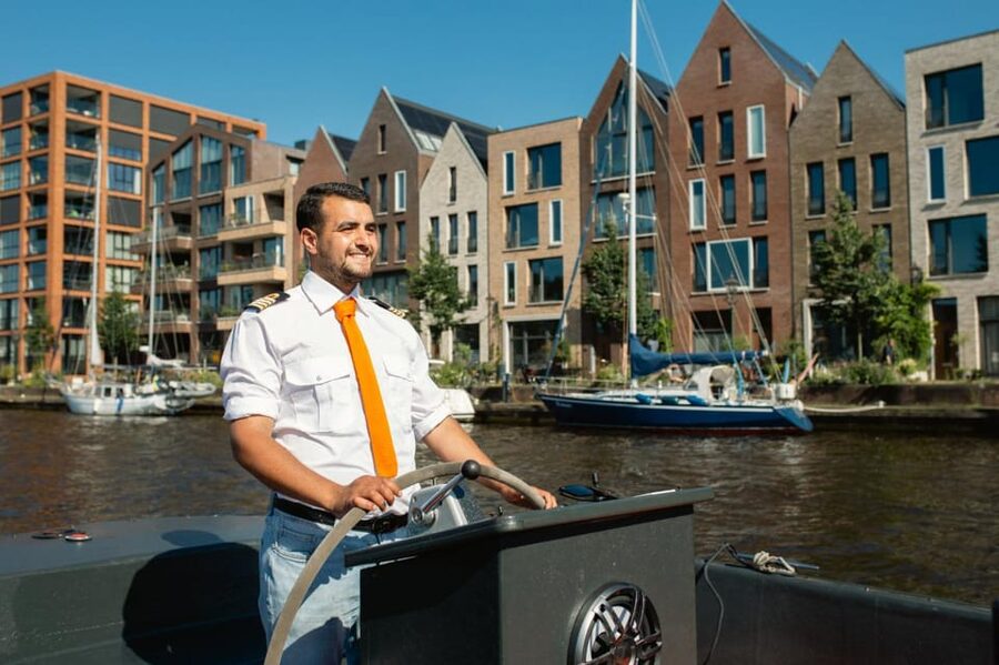 Haarlem: Sightseeing Boat Tour with Snacks and Drinks - Snacks, drinks, and comfort aboard