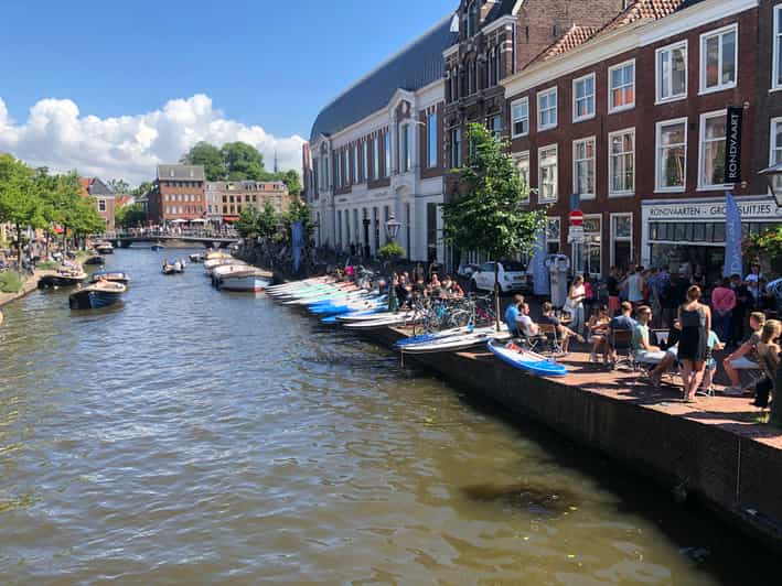 Leiden: Paddleboard Rental to Explore Leiden's Canals - Starting at Aalmarkt 4 beside the boats