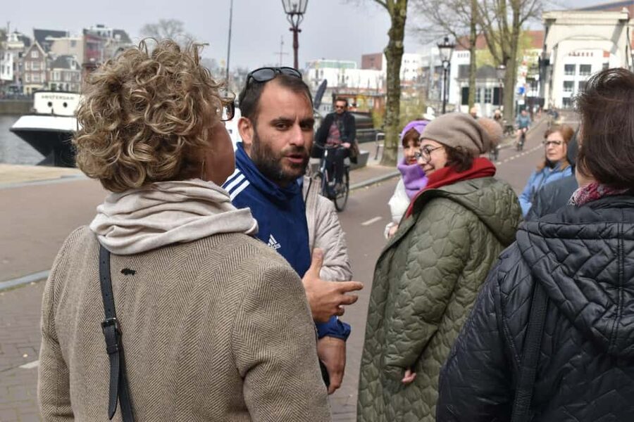 Liberal Amsterdam: Small-Group Walking Tour & Anne Frank VR - Magere Brug and the city’s water story